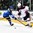 GRAND FORKS, NORTH DAKOTA - APRIL 23: USA's Casey Mittelstadt #20 and Finland's Henri Jokiharju #28 battle for the puck during semifinal round action at the 2016 IIHF Ice Hockey U18 World Championship. (Photo by Minas Panagiotakis/HHOF-IIHF Images)

